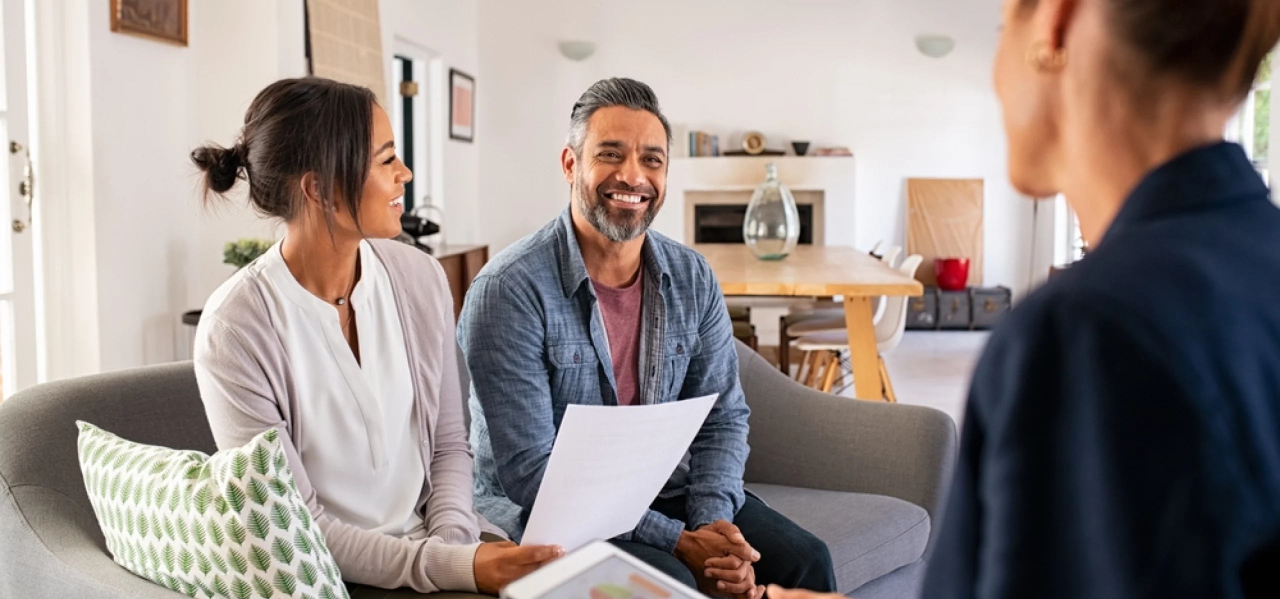 Couple discussing investing in Rolleston subdivision